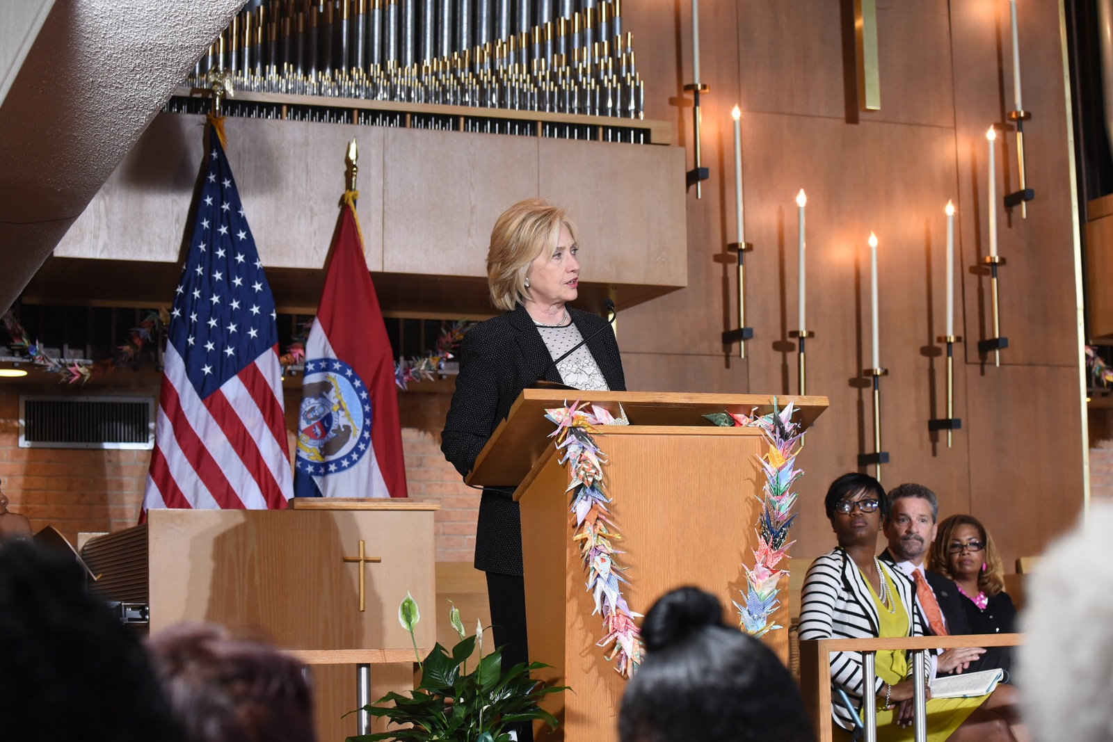 Image of Hillary Clinton in church behind pulpit
