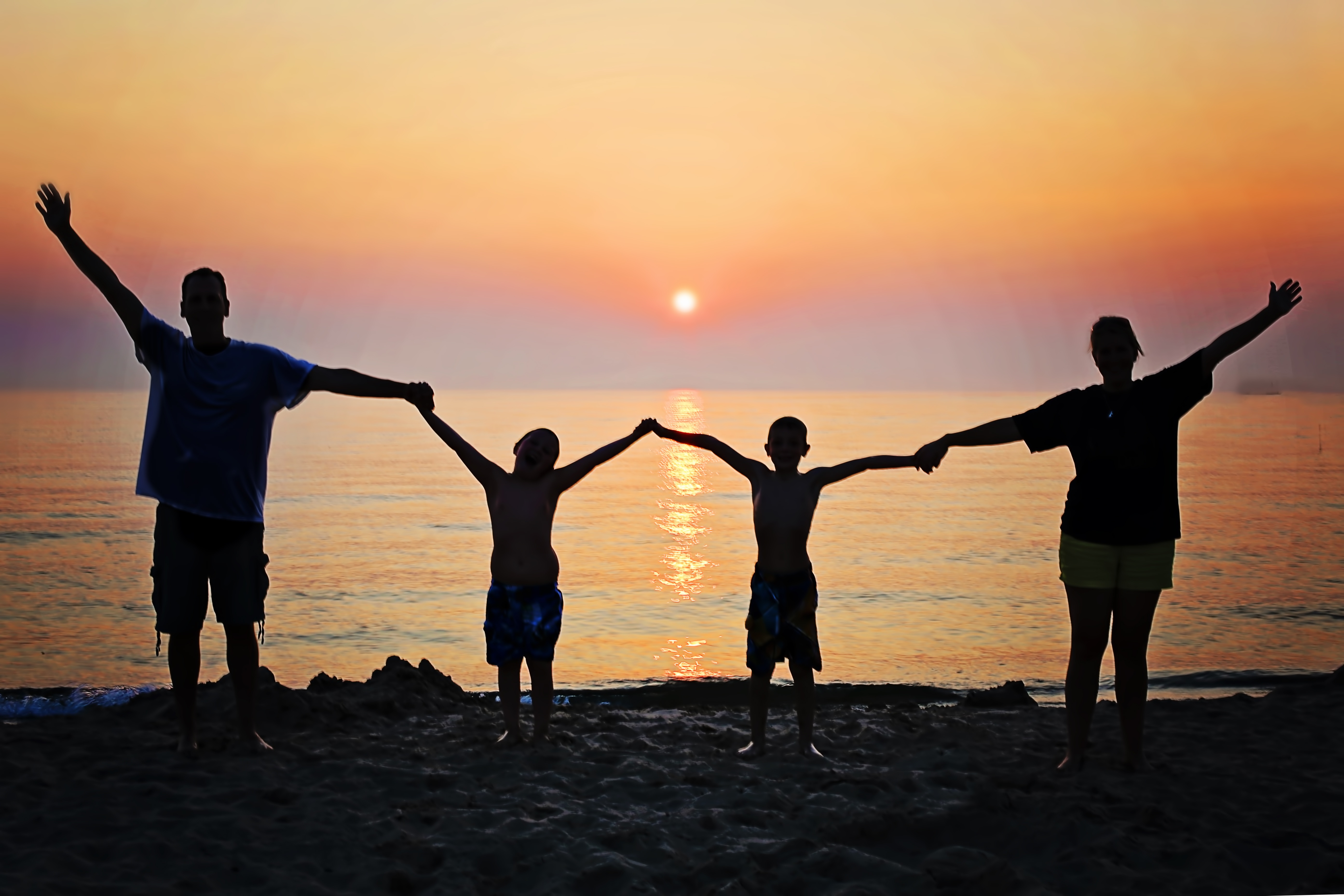 Image of family on beach