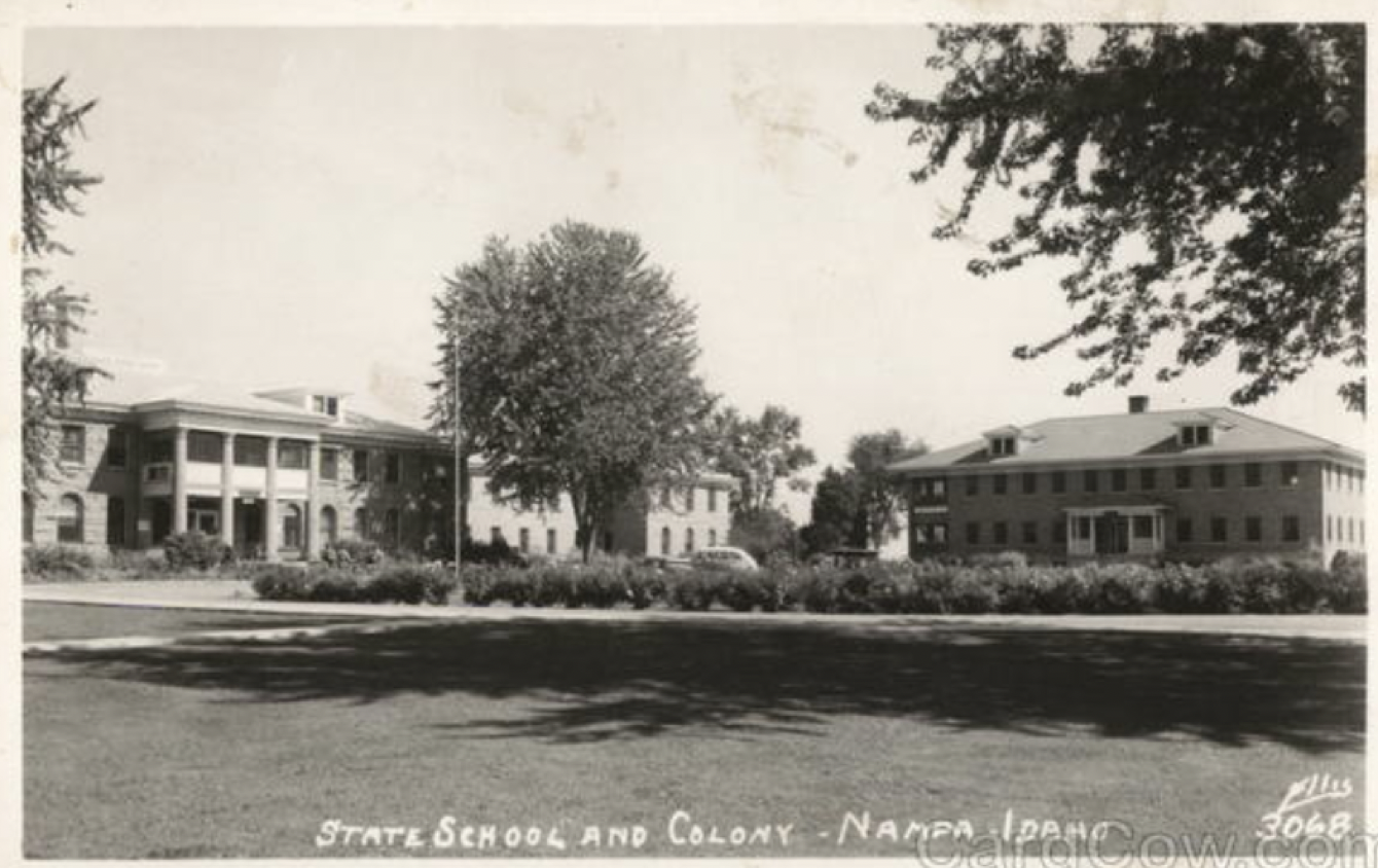 A black and white photograph of the Idaho State School and Colony in Nampa, ID