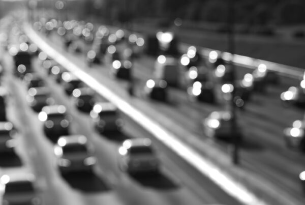 Black and white highway car traffic bokeh background